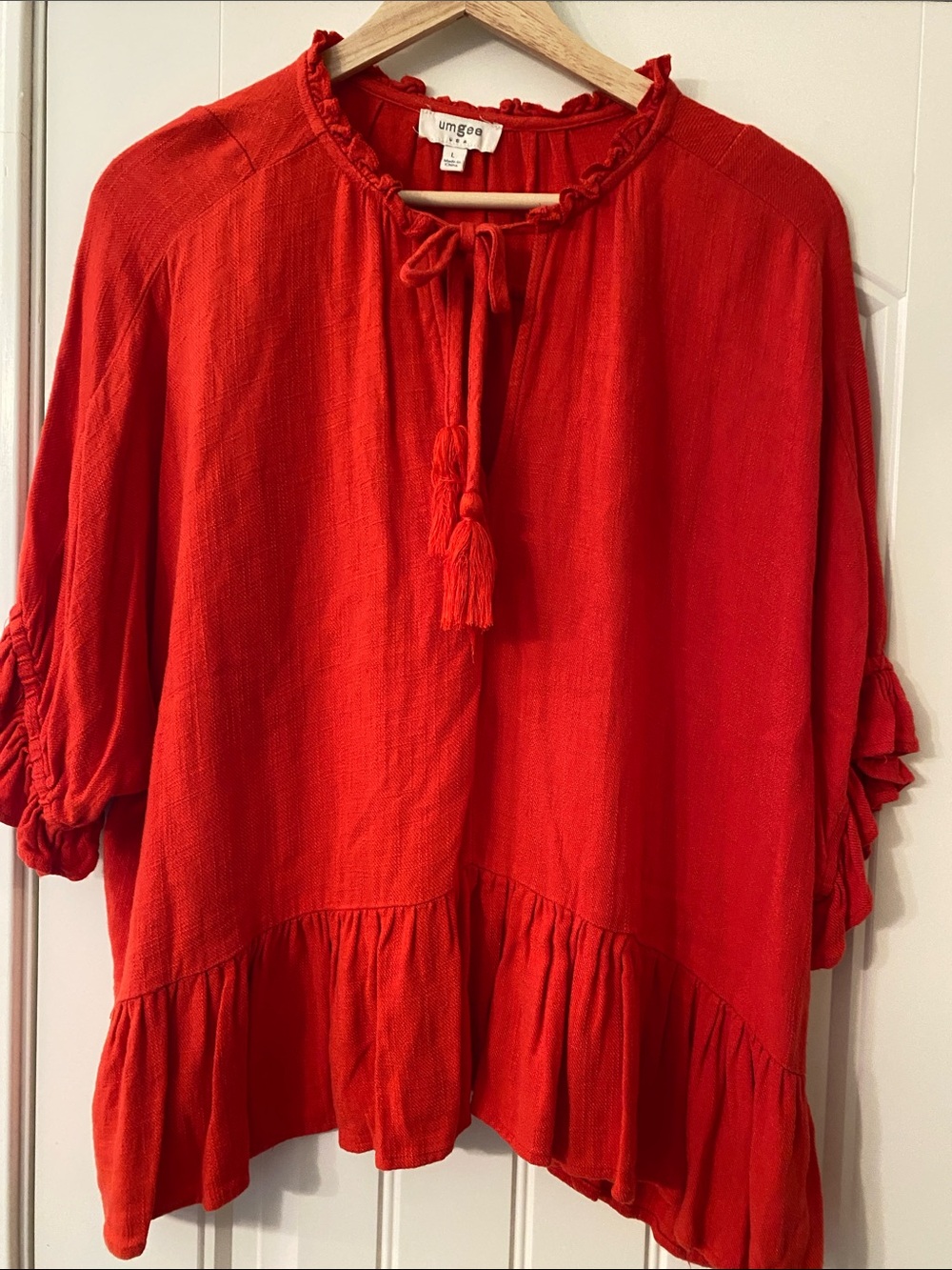 Umgee Red Tassel Tie-Neck Ruffle Hem Tunic